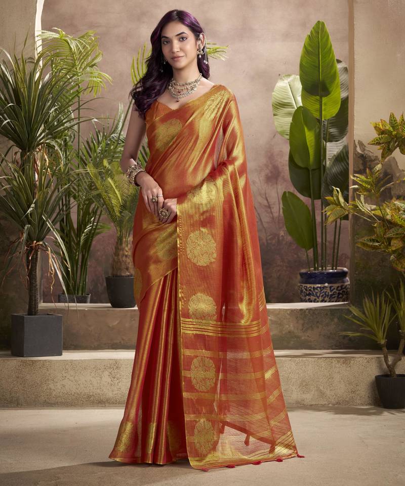 Women's rust tissue silk zari woven saree with unstitched silk blouse piece