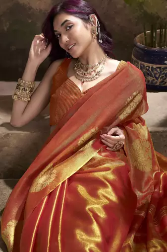 Women's rust tissue silk blend zari woven saree with unstitched silk blend blouse piece