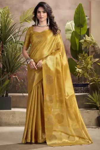 Women's gold tissue silk zari woven saree with unstitched silk blouse piece