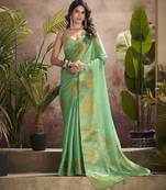 Women's sea green tissue silk zari woven saree with unstitched silk blouse piece