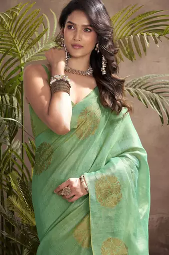 Women's sea green tissue silk blend zari woven saree with unstitched silk blend blouse piece