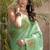Women's sea green tissue silk zari woven saree with unstitched silk blouse piece
