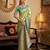 Women's green tissue silk zari woven saree with unstitched silk blouse piece