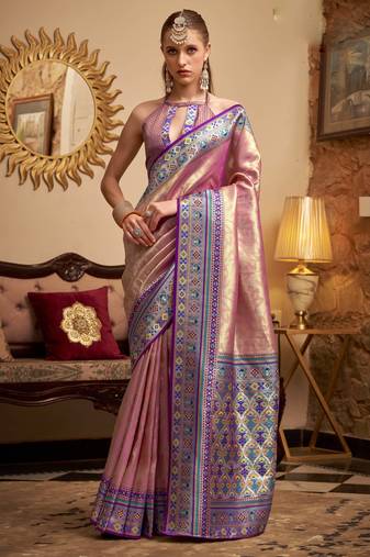 Women's pink tissue silk zari woven saree with unstitched silk blouse piece