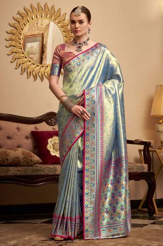 Women's turquoise tissue silk zari woven saree with unstitched silk blouse piece