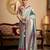Women's turquoise tissue silk zari woven saree with unstitched silk blouse piece