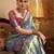 Women's turquoise tissue silk zari woven saree with unstitched silk blouse piece