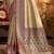 Women's beige tissue silk zari woven saree with unstitched silk blouse piece