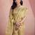 Women's beige tissue silk zari woven saree with unstitched silk blouse piece