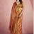 Women's rust tissue silk zari woven saree with unstitched silk blouse piece