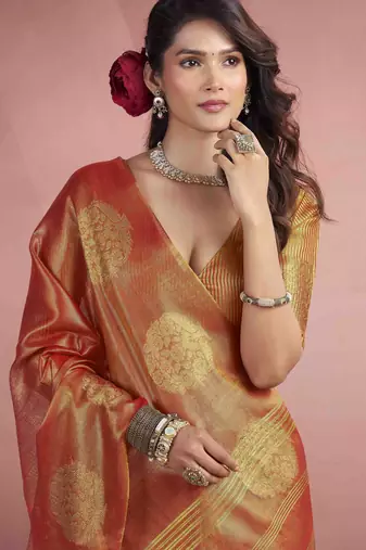 Women's rust tissue silk blend zari woven saree with unstitched silk blend blouse piece
