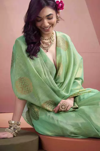 Women's sea green tissue silk blend zari woven saree with unstitched silk blend blouse piece