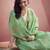 Women's sea green tissue silk zari woven saree with unstitched silk blouse piece