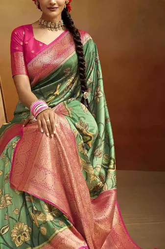 Women's green tissue silk blend kalamkari saree with unstitched silk blend blouse piece