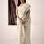 Women's cream linen silk woven saree with unstitched silk blouse piece