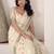 Women's cream linen silk woven saree with unstitched silk blouse piece