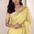Women's yellow linen silk woven saree with unstitched silk blouse piece