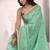 Women's turquoise linen silk woven saree with unstitched silk blouse piece