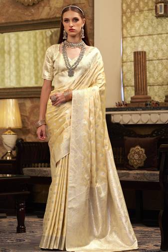 Women's yellow satin banarasi silk saree with unstitched silk blouse piece