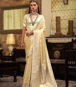 Women's yellow satin banarasi silk saree with unstitched silk blouse piece