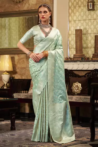 Women's turquoise satin banarasi silk saree with unstitched silk blouse piece