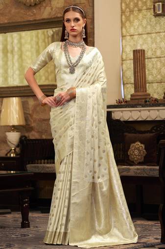 Women's cream satin banarasi silk saree with unstitched silk blouse piece