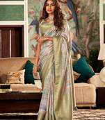 Women's pista handloom silk saree with unstitched silk blouse piece