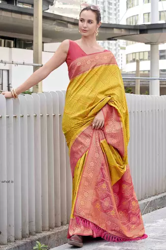 Women's yellow soft silk blend bandhani saree with unstitched silk blend blouse piece
