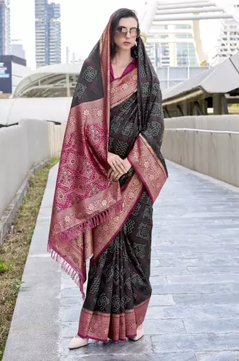 Women's black soft silk blend bandhani saree with unstitched silk blend blouse piece