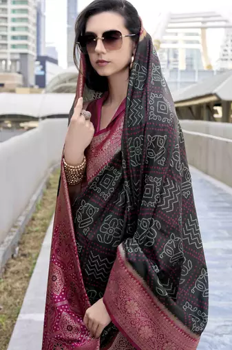Women's black soft silk blend bandhani saree with unstitched silk blend blouse piece