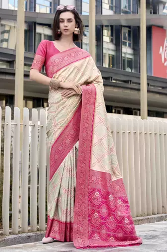 Women's beige soft silk bandhani saree with unstitched silk blouse piece