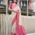 Women's beige soft silk blend bandhani saree with unstitched silk blend blouse piece