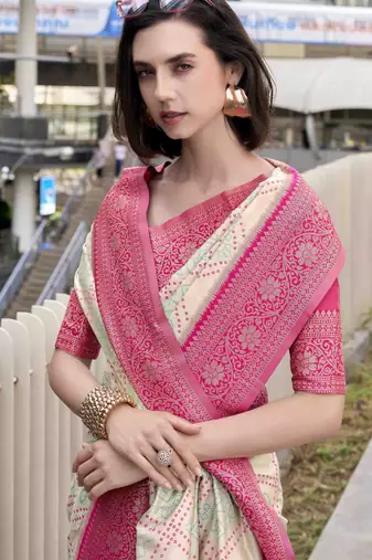 Women's beige soft silk blend bandhani saree with unstitched silk blend blouse piece