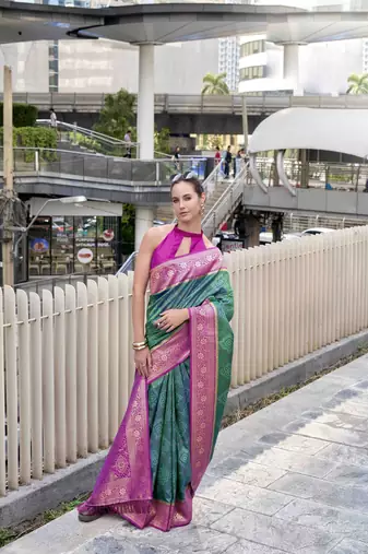 Women's dark green soft silk bandhani saree with unstitched silk blouse piece