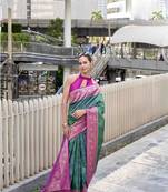 Women's dark green soft silk bandhani saree with unstitched silk blouse piece