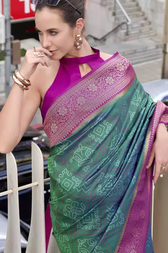 Women's dark green soft silk blend bandhani saree with unstitched silk blend blouse piece