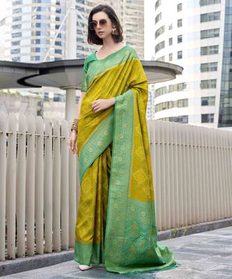 Women's neon soft silk blend bandhani saree with unstitched silk blend blouse piece 1