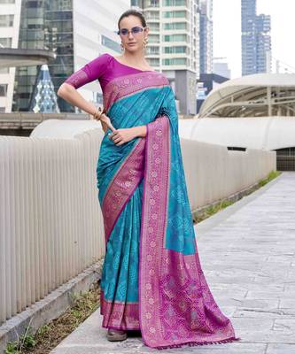 Women's teal soft silk blend bandhani saree with unstitched silk blend blouse piece 1