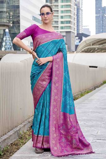 Women's teal soft silk bandhani saree with unstitched silk blouse piece