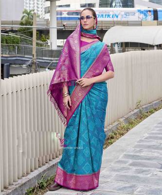 Women's teal soft silk blend bandhani saree with unstitched silk blend blouse piece 2