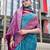 Women's teal soft silk bandhani saree with unstitched silk blouse piece