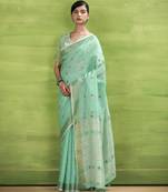 Women's turquoise linen silk woven saree with unstitched silk blouse piece