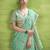 Women's turquoise linen silk woven saree with unstitched silk blouse piece