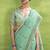 Women's turquoise linen silk woven saree with unstitched silk blouse piece