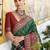 dark green soft ikat printed silk blend saree with unstitched blouse piece