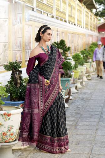 black soft ikat printed silk blend saree with unstitched blouse piece