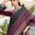 black soft ikat printed silk blend saree with unstitched blouse piece