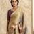 Women's chiku satin crepe printed saree with unstitched silk blouse piece