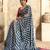 Women's blue satin crepe printed saree with unstitched silk blouse piece