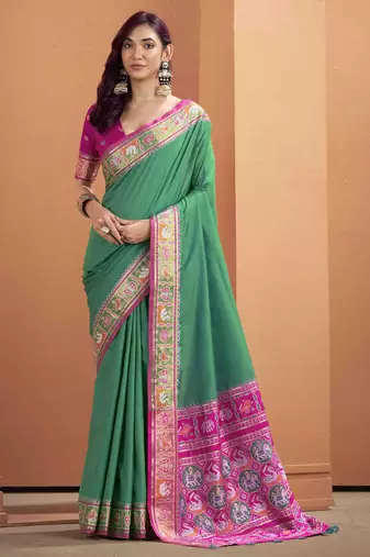 Women's dark green patola silk kalamkari saree with unstitched silk blouse piece